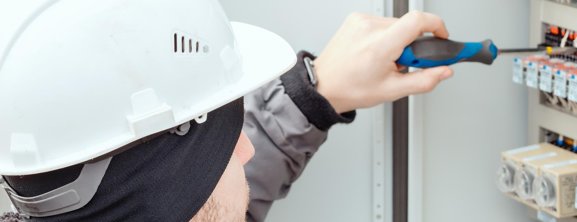 Electrician performing detailed panel work during electrical inspections in Sebastopol.